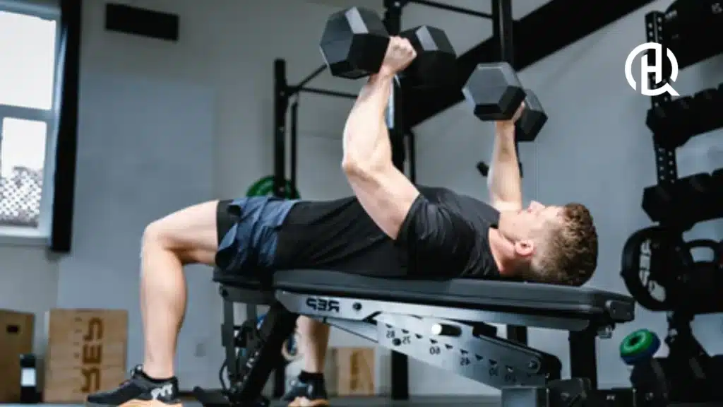Man in black shirt doing chest exercises