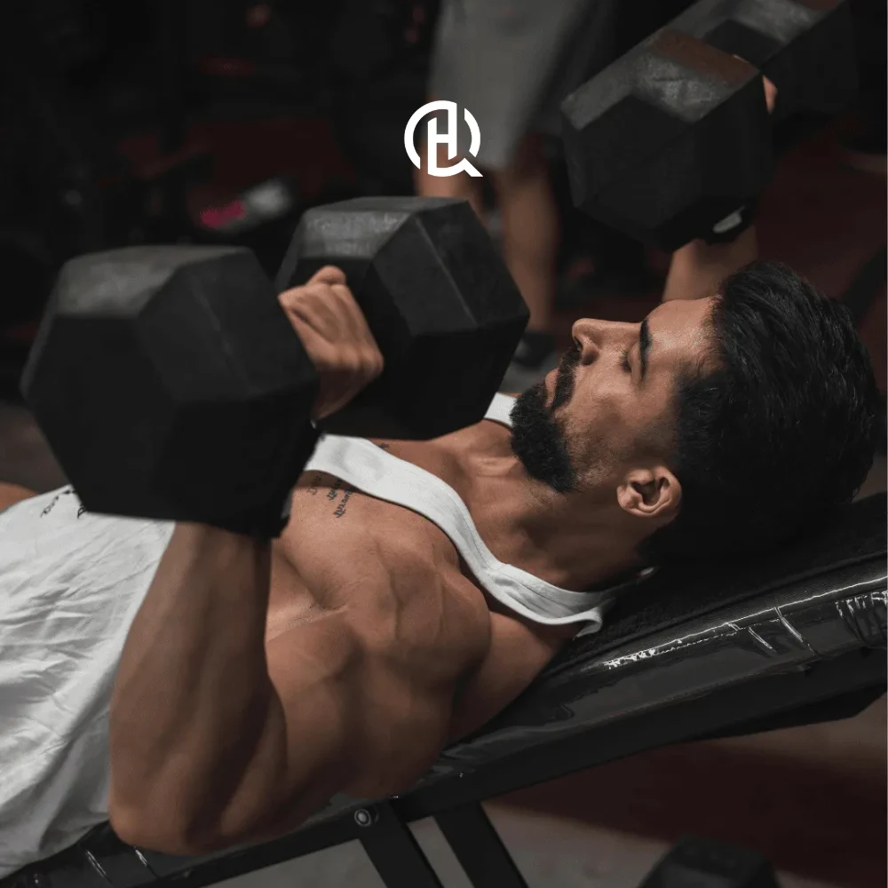 Image of guy doing the incline dumbbell bench press