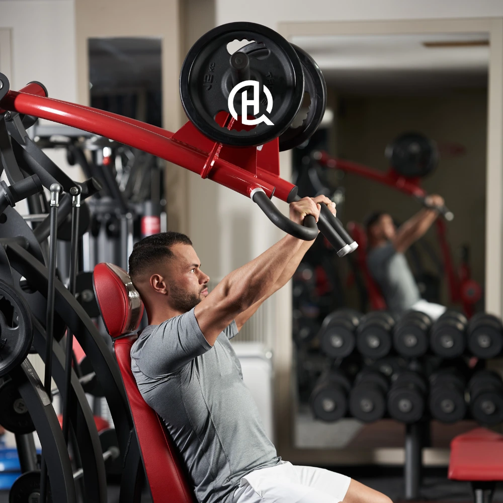 A person doing a chest press exercise.