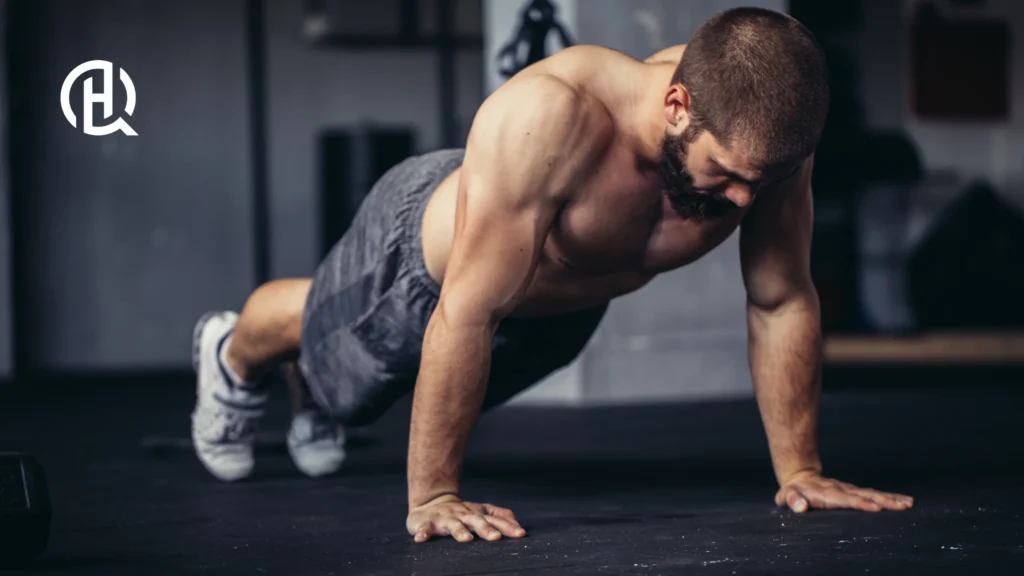Shirtless man doing push-ups