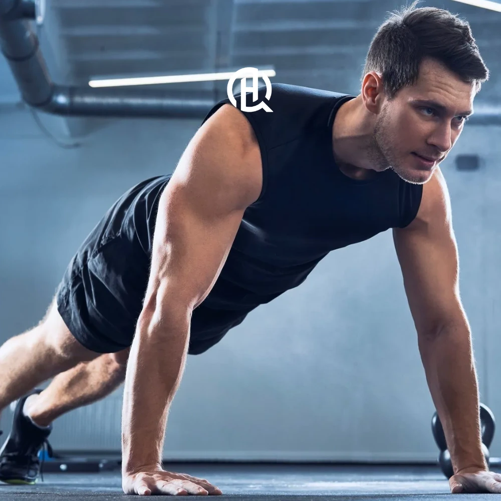 Guy in vlack sando doing push up