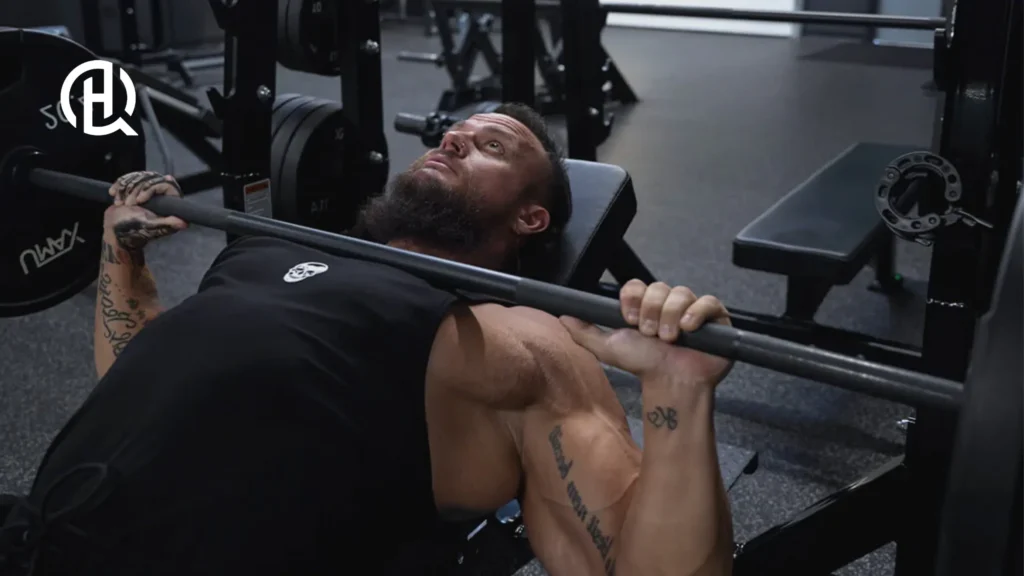 Bearded man doing incline dumbell bench press
