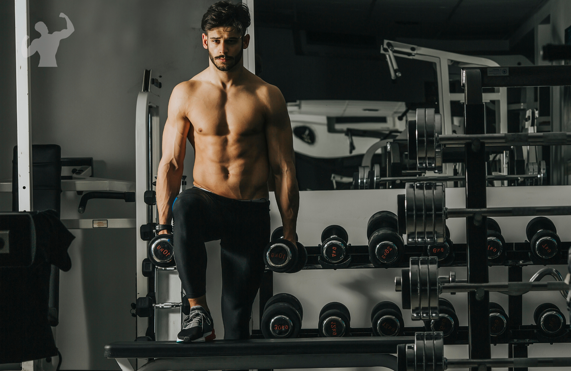 Image of a guy doing warmups in the gym