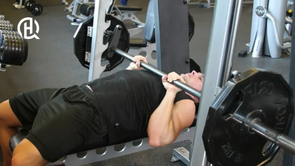 A person demonstrating the Close-Grip Bench Press.