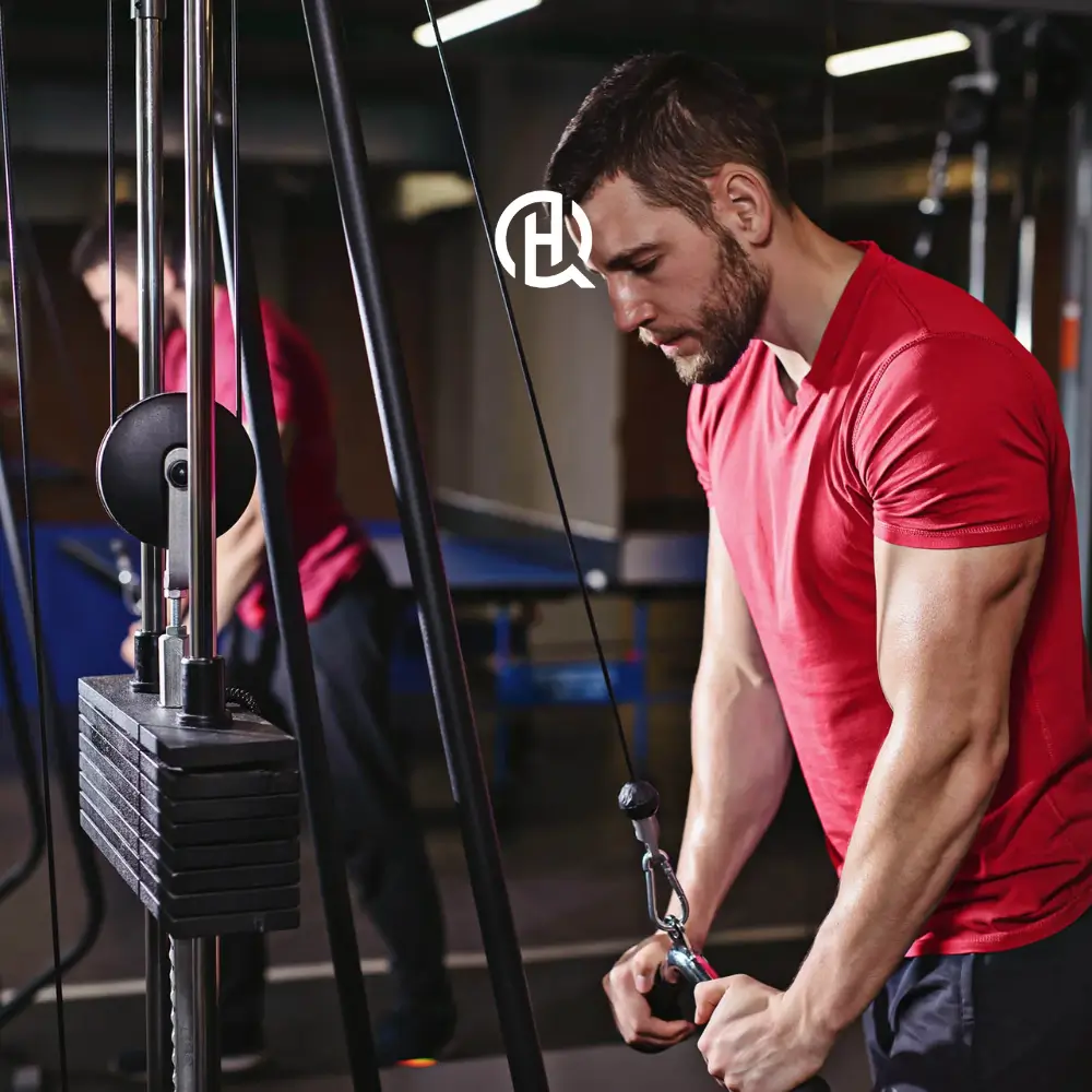 A person performing a triceps exercise.