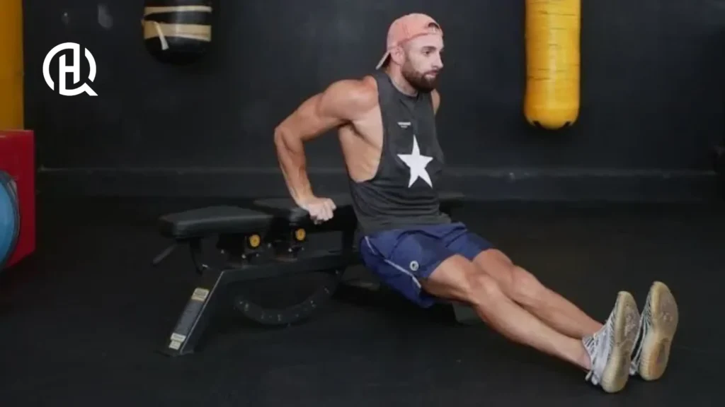 Man doing tricep excercises (Bench Dip)