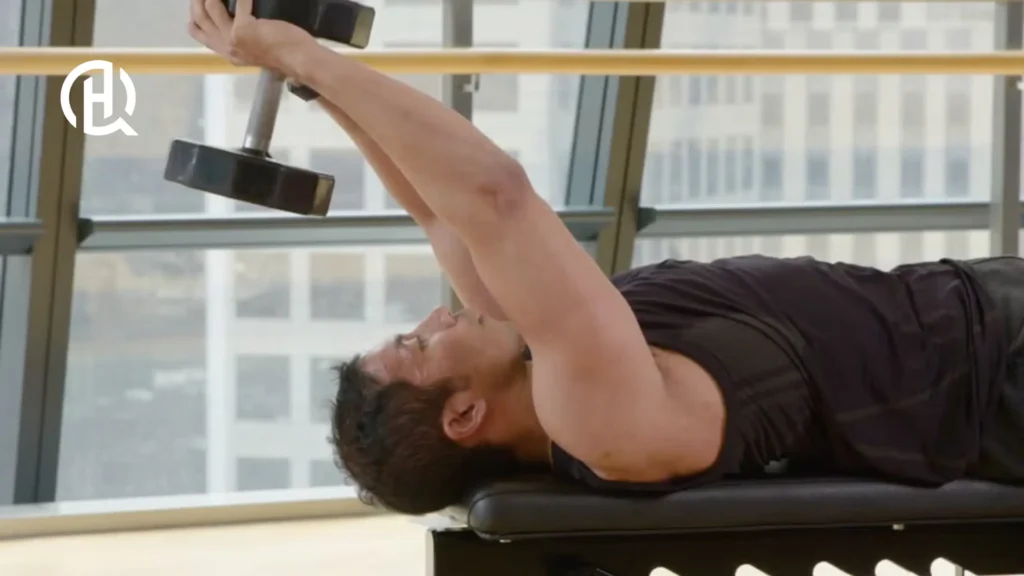 A person demonstrating the triceps extension.