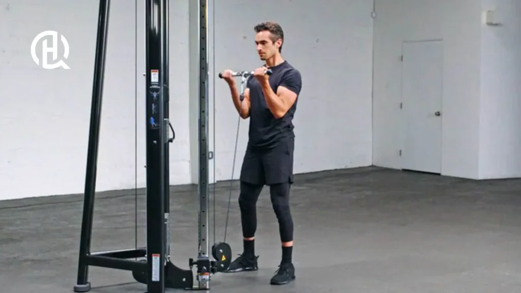 A studio photo of a person training arms.