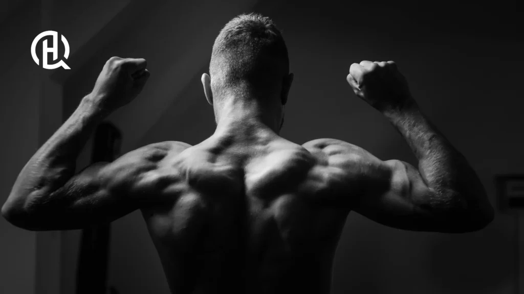 A person flexing his entire back, and arms.