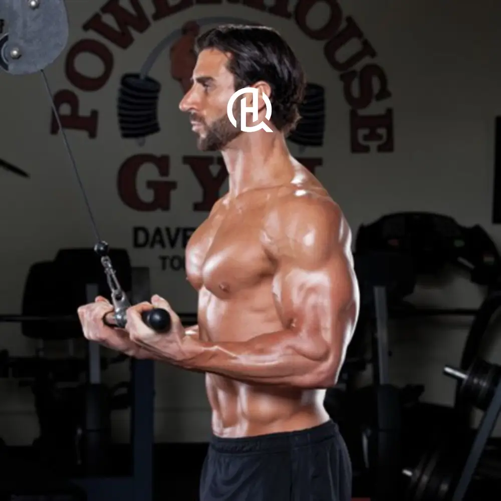 A jacked person showing how to train arms.