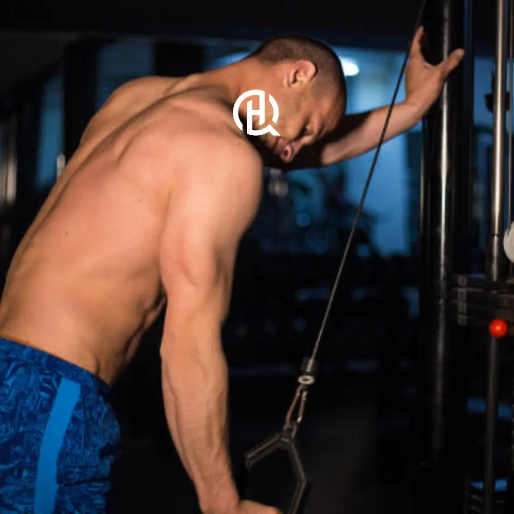 A person doing a triceps exercise.