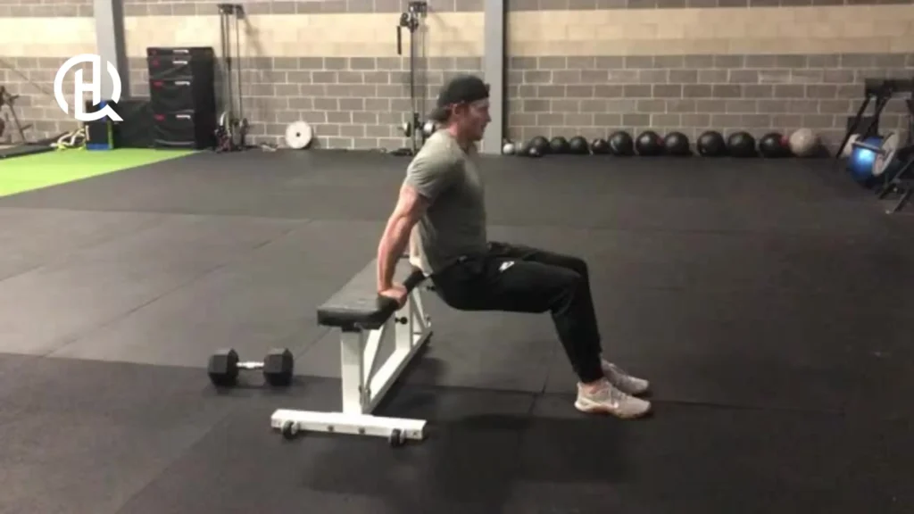 man doing Bench Dips with bent legs.