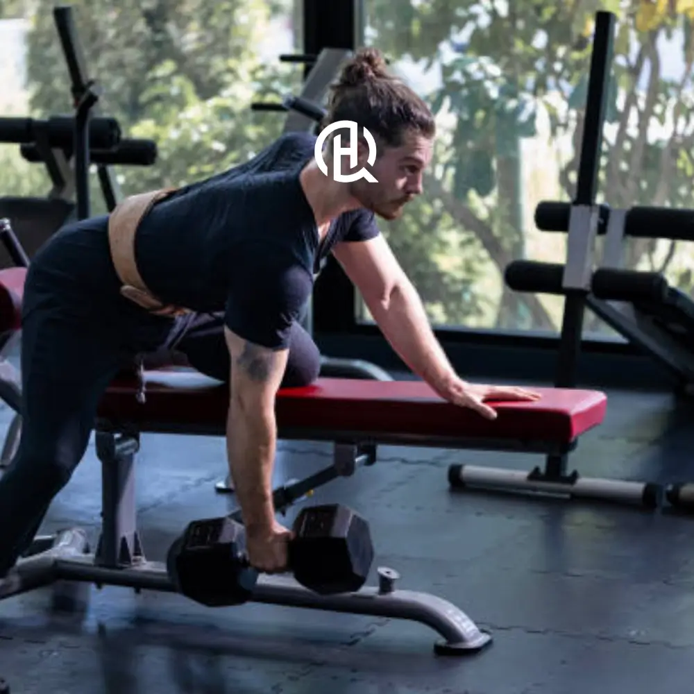 man doing Dumbbell Bent-Over Row