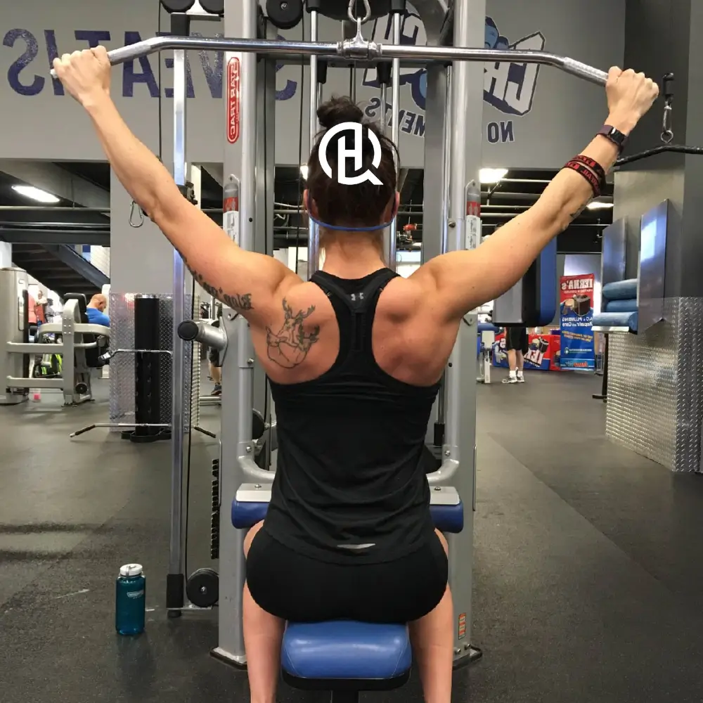 woman doing Wide-Grip Pulldown